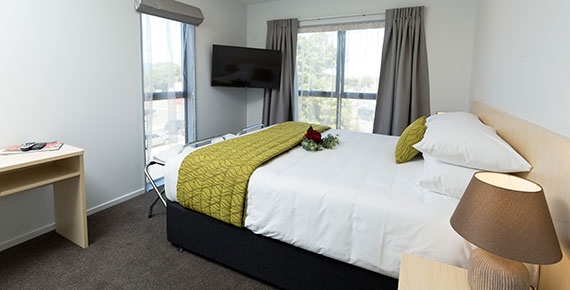 double bedroom on the second level with its own TV